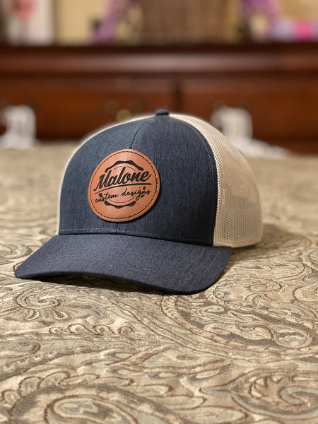 Custom cap with laser engraved leatherette patch.